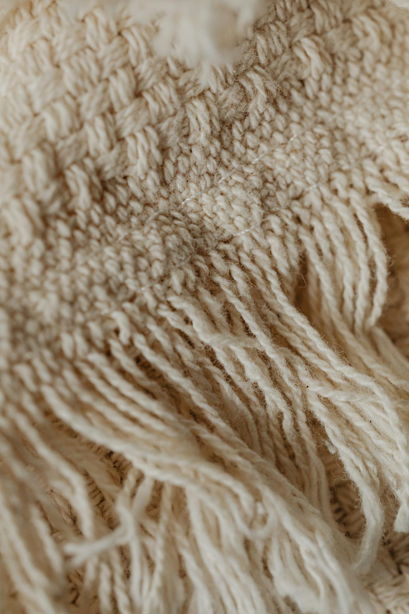 Detalle de fleco de algodón peinado